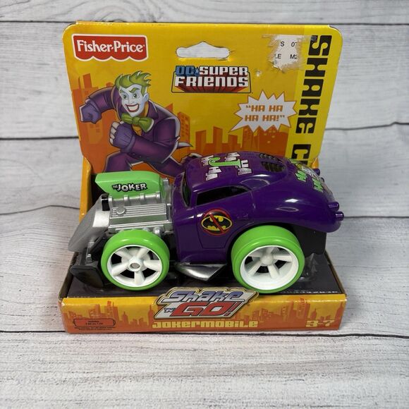 DC Super Friends Fisher Price Shake n Go Jokermobile Roadster Shake Car New - Picture 1 of 5